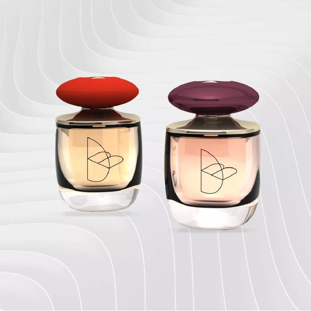 Three perfume bottles with caps made using SURLYN™ Ionomers on grey background