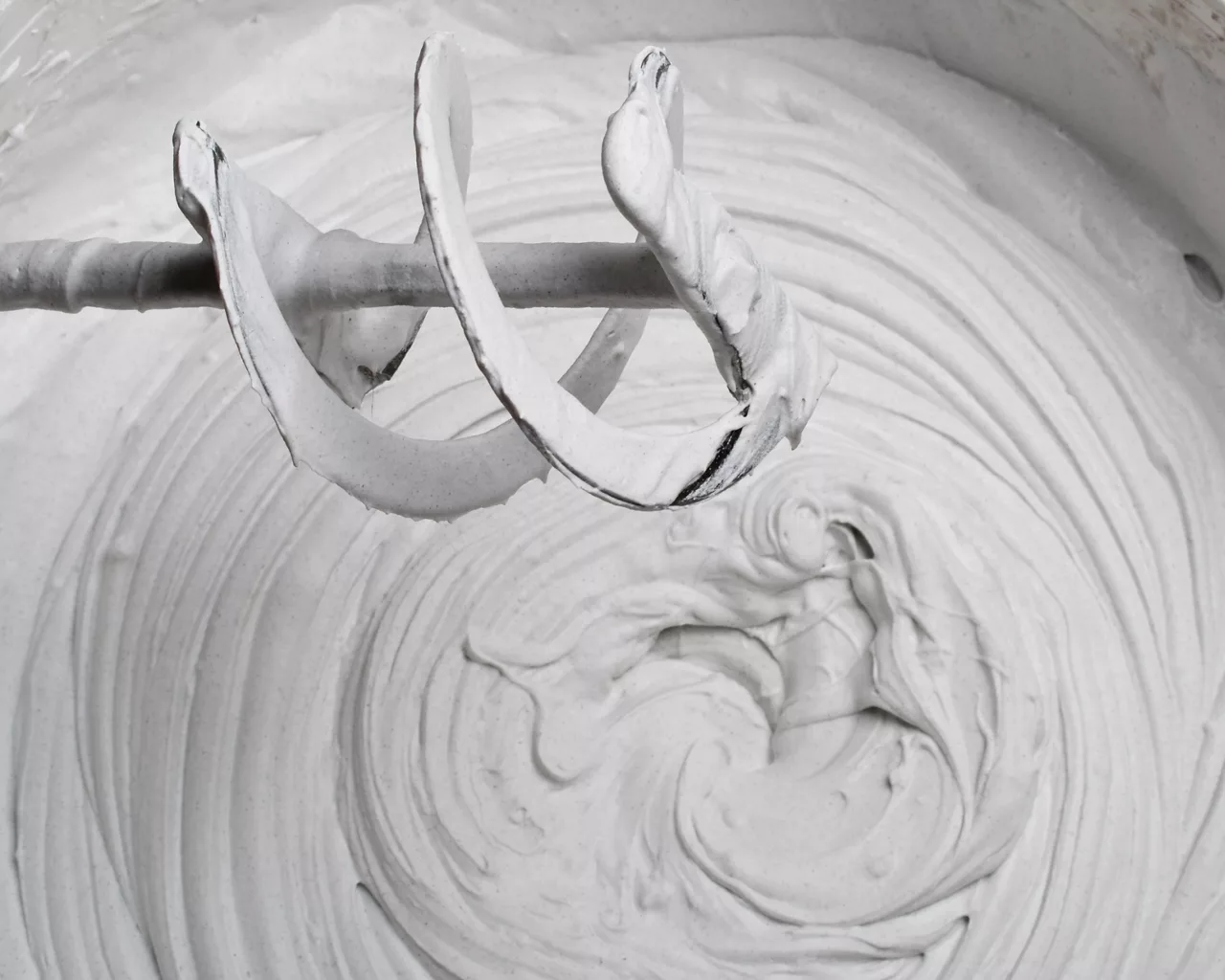 A mixer blending gypsum plaster 