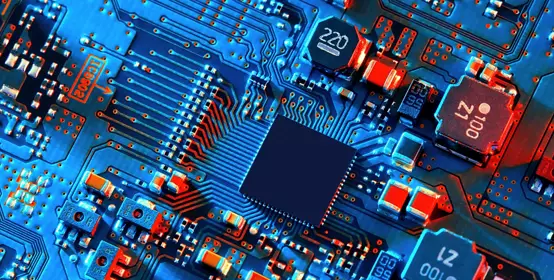 Blue electronic circuit board close up.