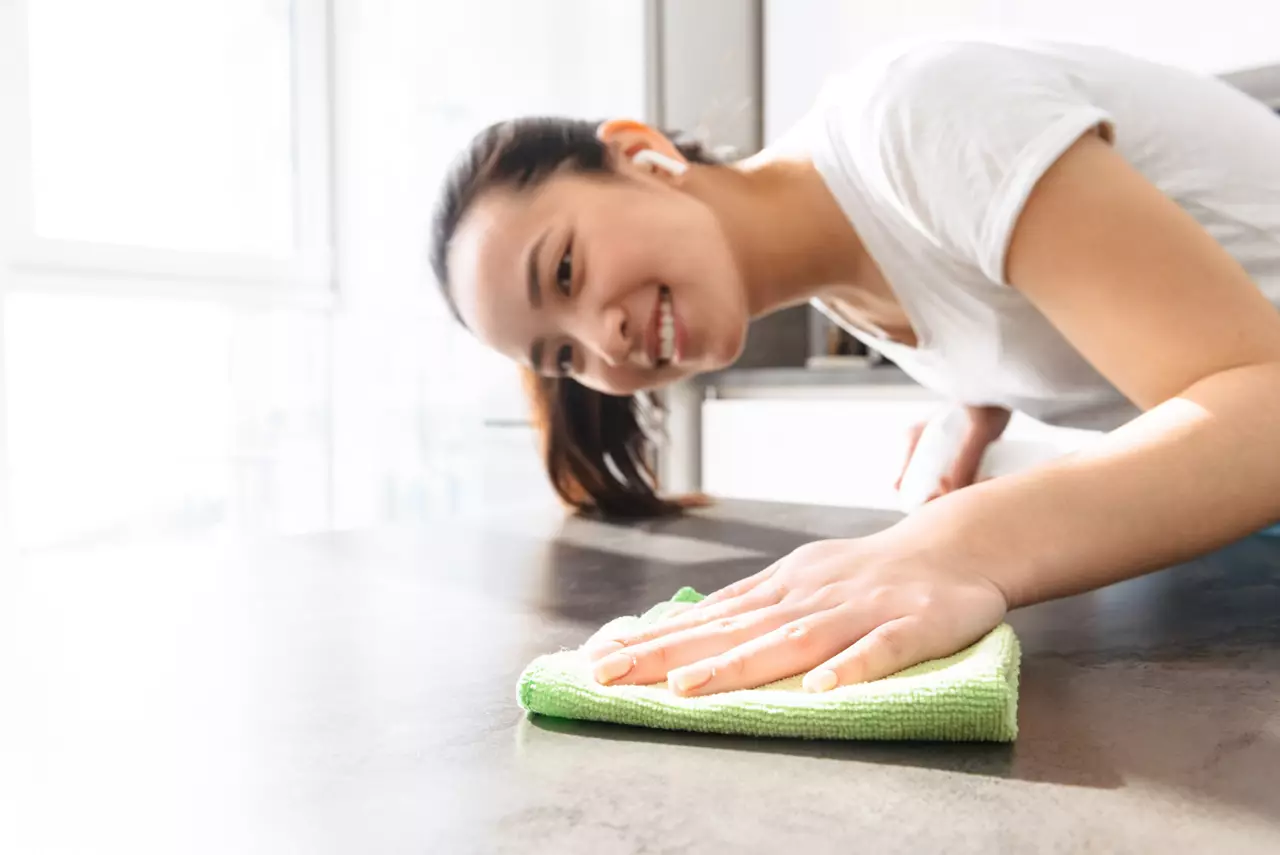 Woman admiring clean counter