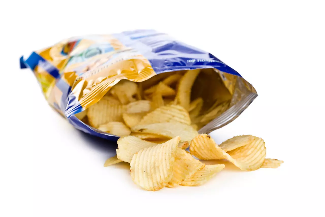 potato chips in bag on white background