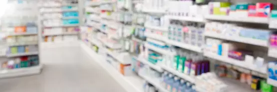 Medicines arranged in shelves at pharmacy