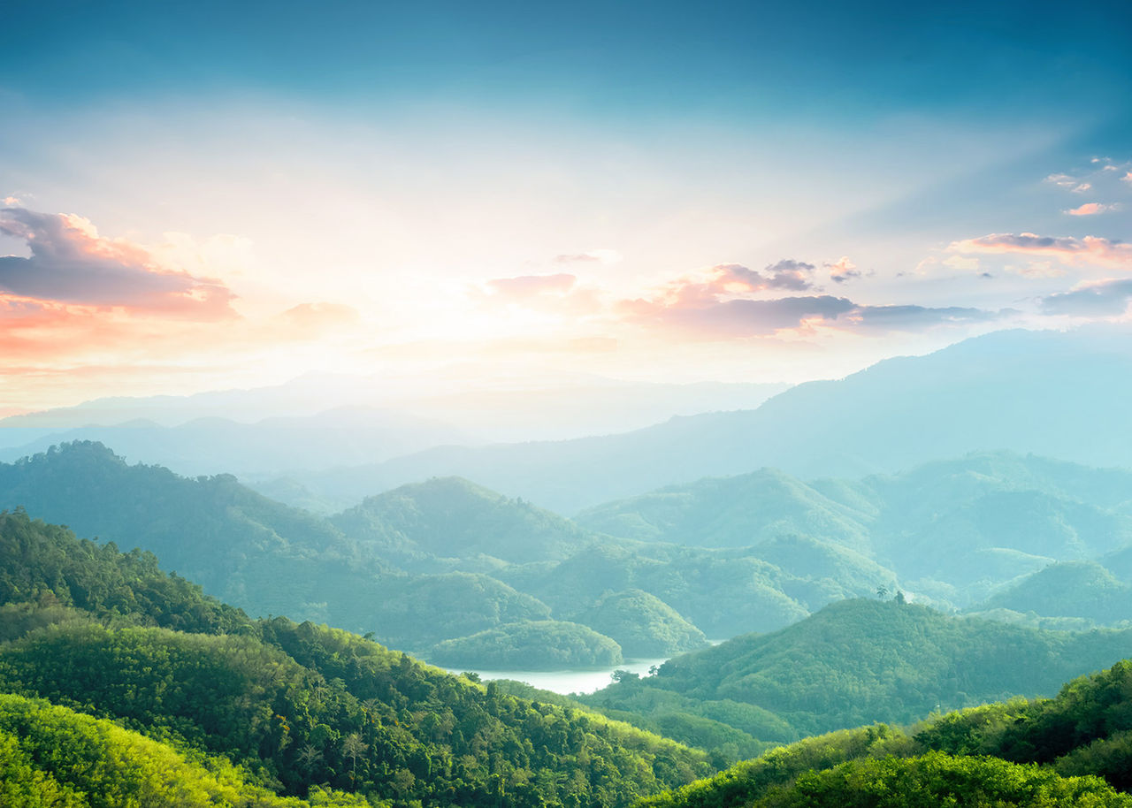 World Environment Day concept: Green mountains and beautiful sky
World Environment Day concept: Green mountains and beautiful sky clouds under the blue sky