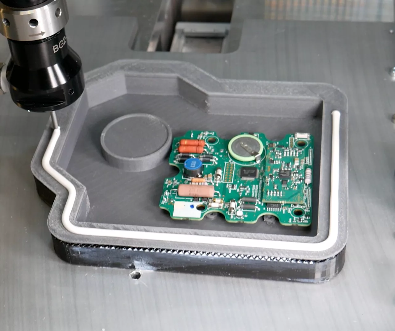Adhesive applied to seal heatsink assembly.