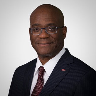 A portrait of John Sampson