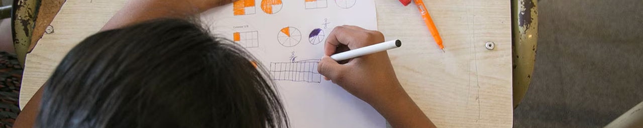 student working at desk